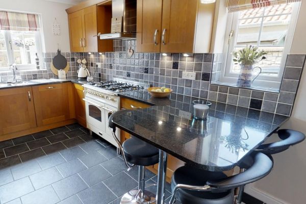 Add flowers and fruit to give the kitchen an instant lift