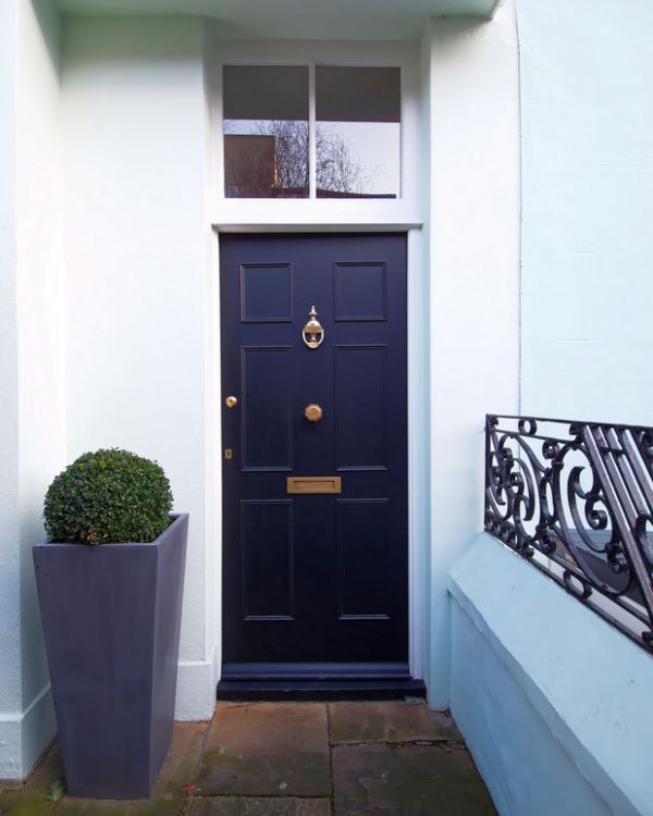 kerb appeal - front door with pot plant